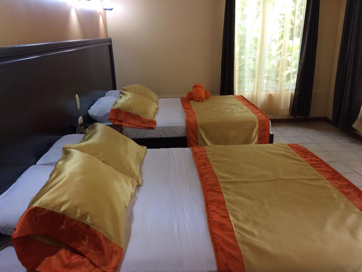 Mussaenda, Arenal Hotel La Fortuna Luaran gambar